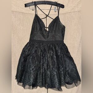 BEBE size 8 Black Lace mini dress with tulle bottom